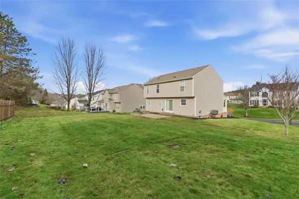 a view of a backyard with garden