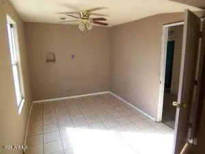 a kitchen with a sink cabinets and a stove top oven