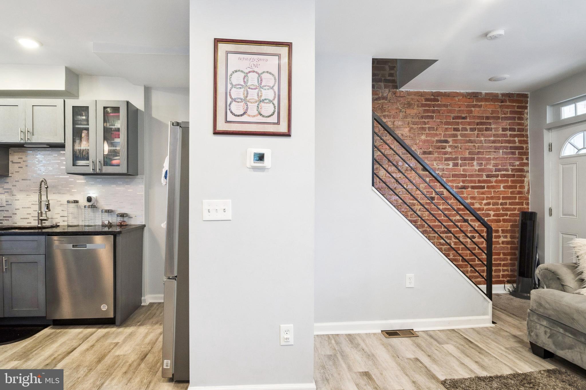 3404 Lyndale Avenue Baltimore, MD 21213 - Photo 3 of 25 a bathroom with a sink and a mirror