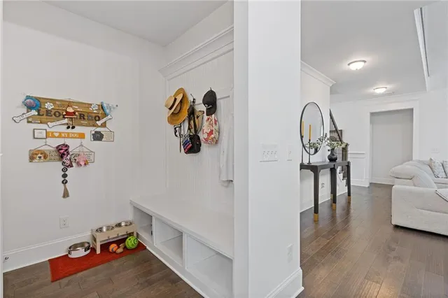 a kitchen with a stove a sink and a refrigerator