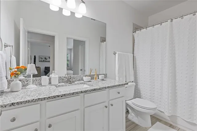 a bed room with a bed and window