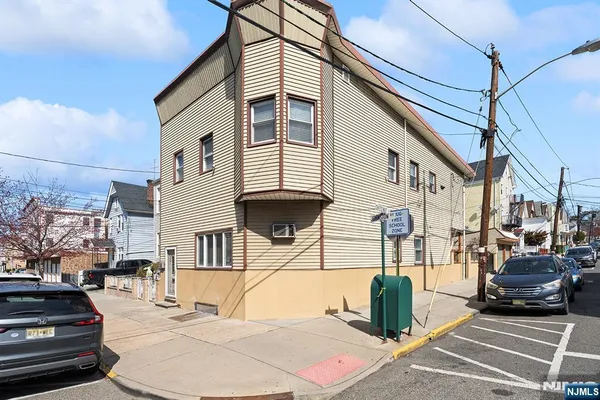 front view of a house with a street