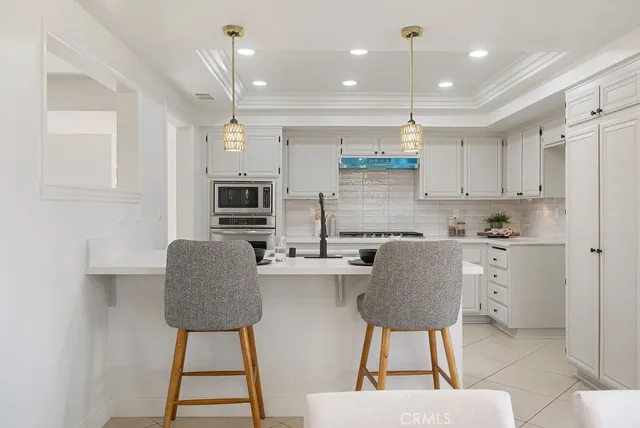 a bathroom with a sink vanity and a mirror