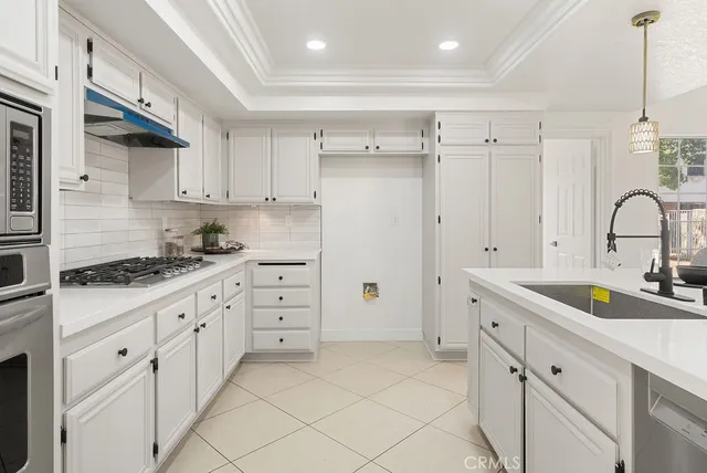 a view of an empty room and wooden floor