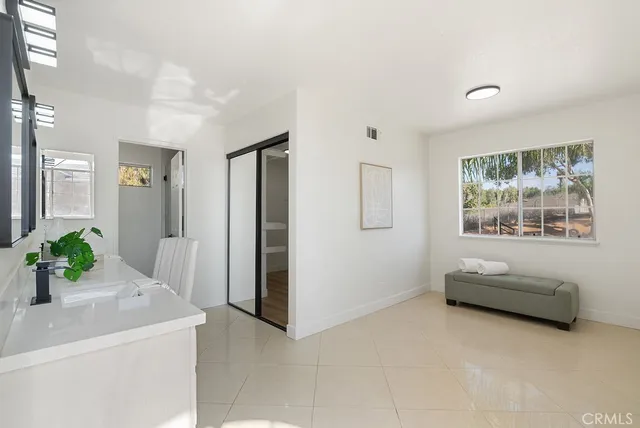 a view of a house with swimming pool and a yard