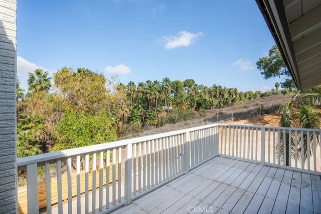 a house with a yard and a large parking space