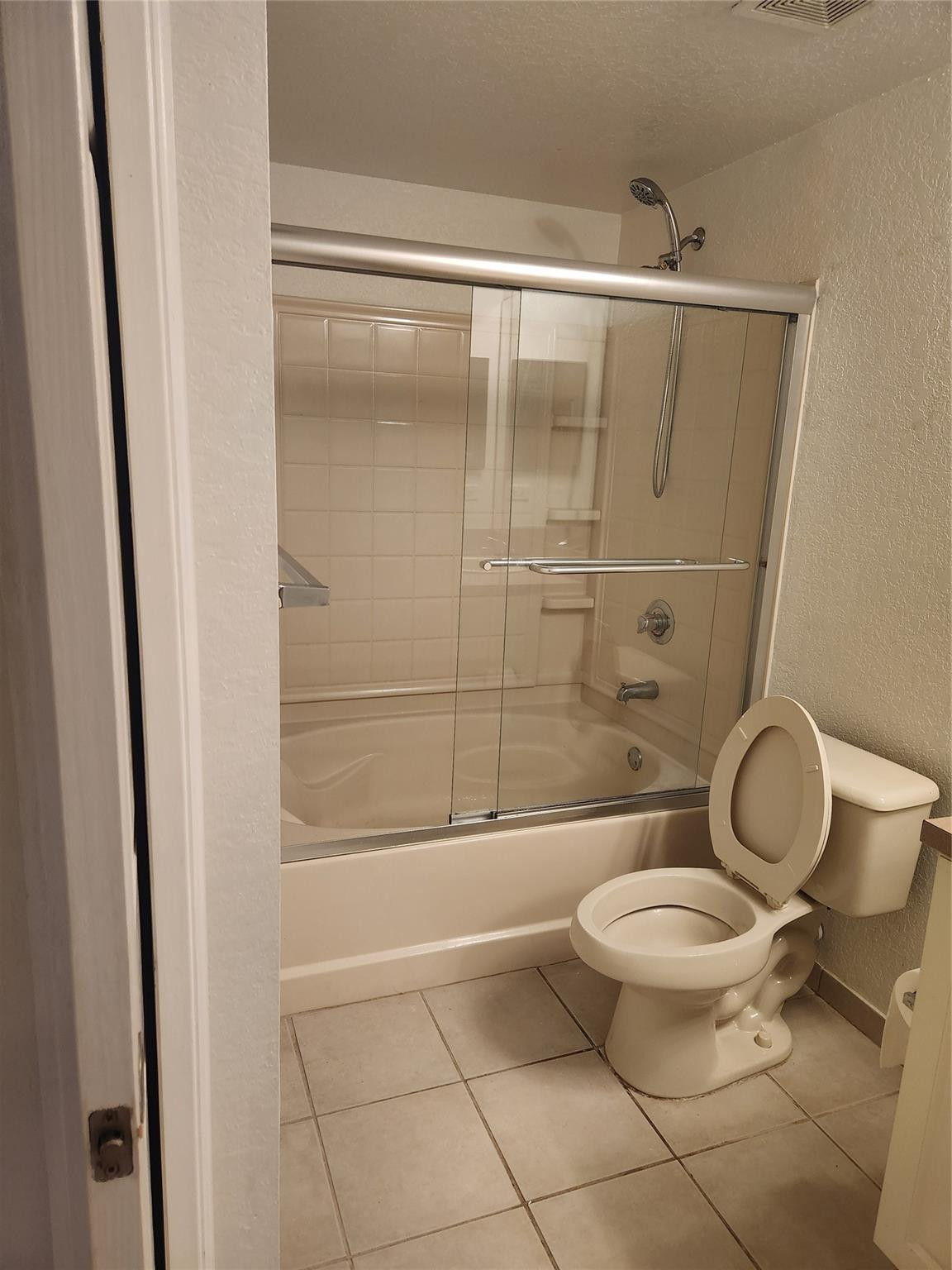 6778 West Sample Road, Unit 6778 Pompano Beach, FL 33067 - Photo 18 of 20 a bathroom with a toilet and a shower