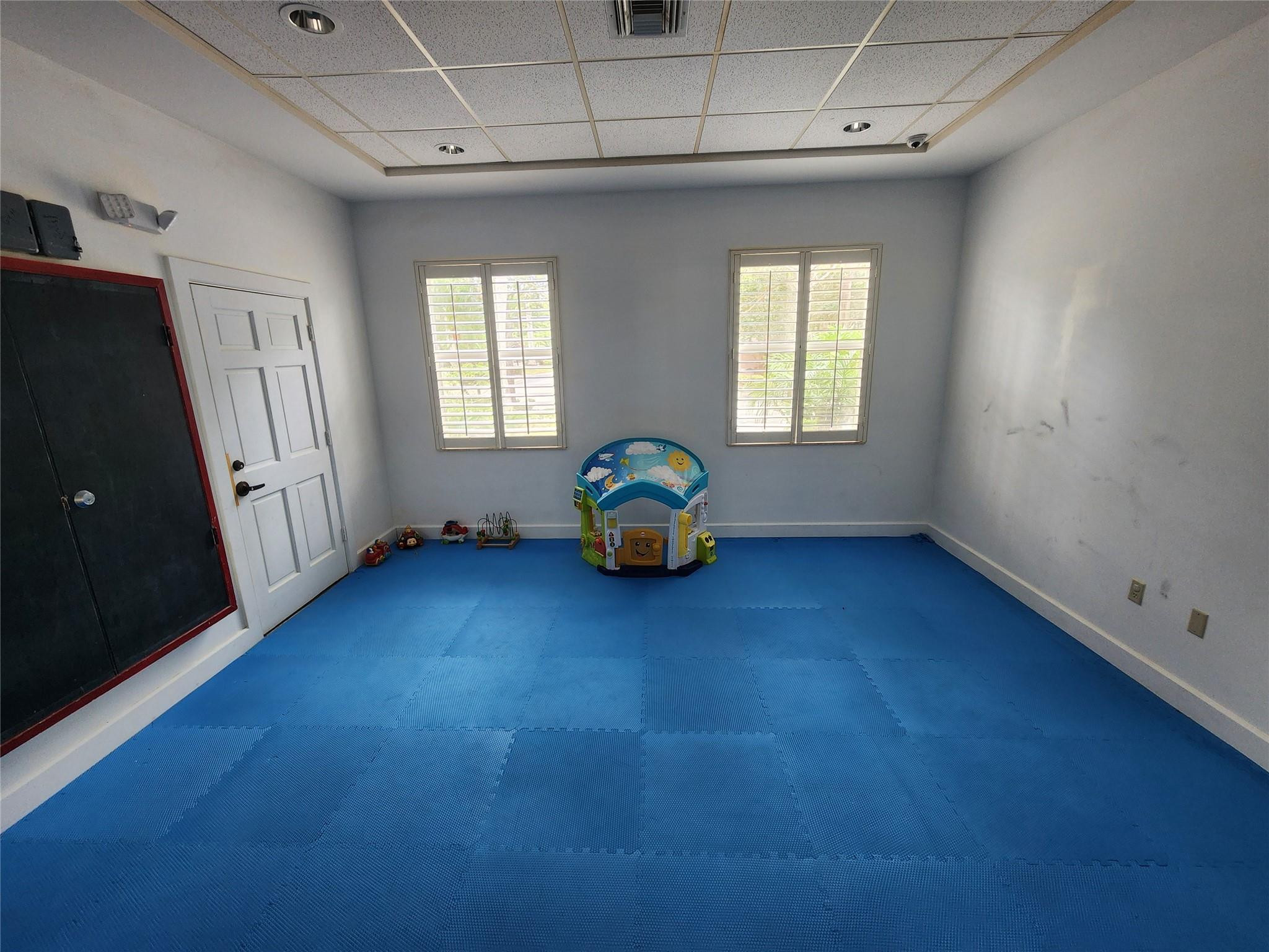 6778 West Sample Road, Unit 6778 Pompano Beach, FL 33067 - Photo 7 of 20 a living room with furniture and window