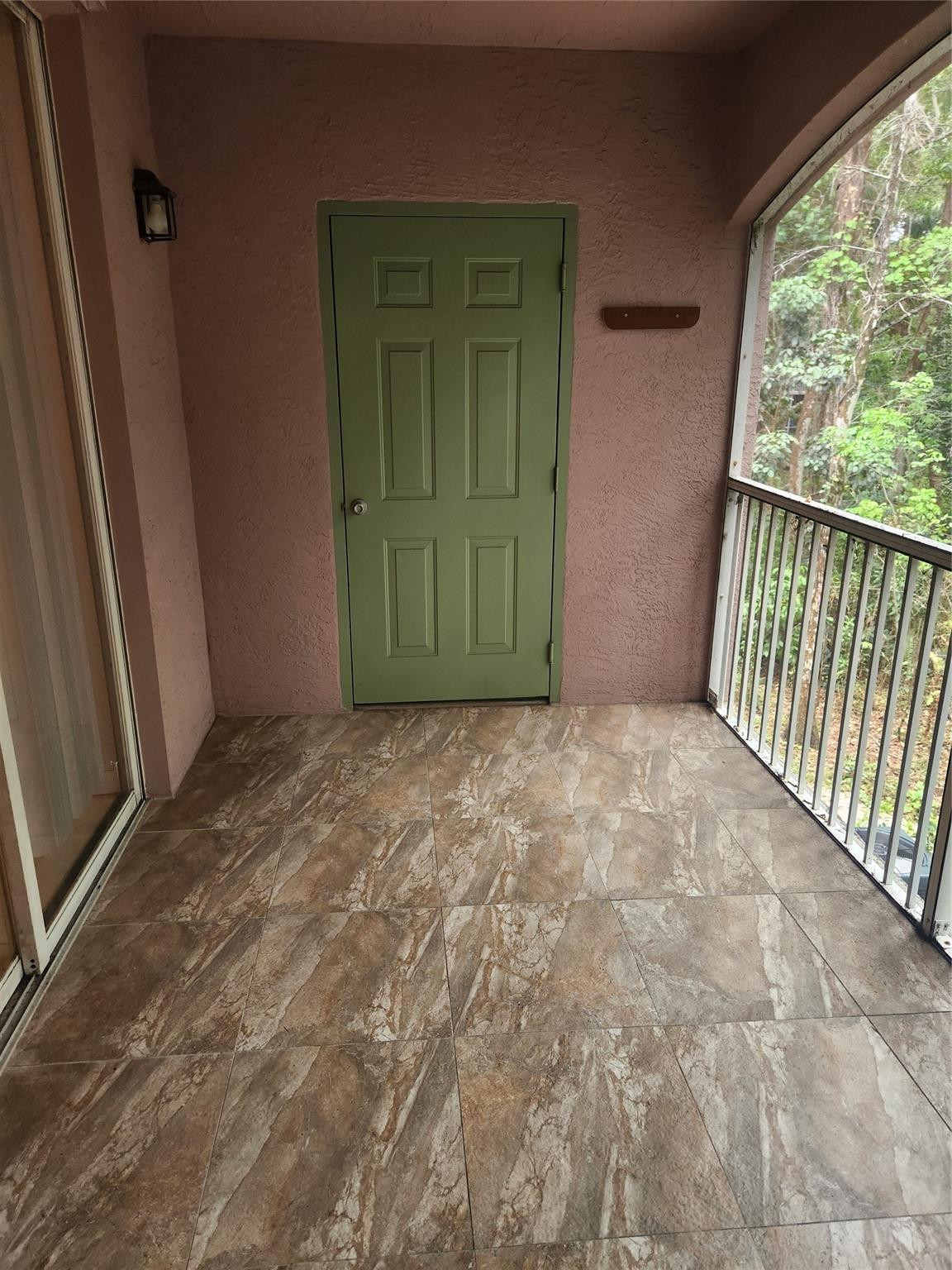 6778 West Sample Road, Unit 6778 Pompano Beach, FL 33067 - Photo 8 of 20 a view of an empty room with a window