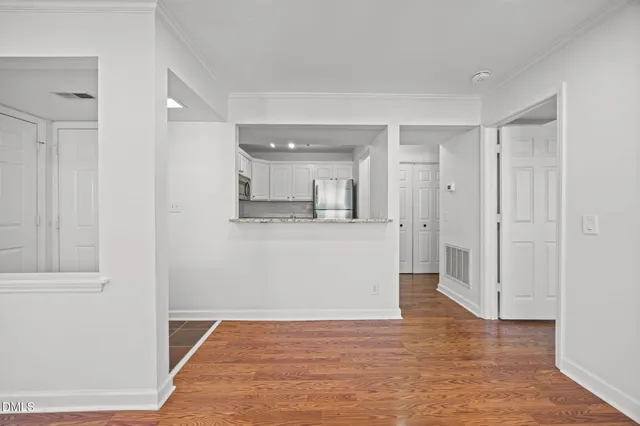 a view of kitchen with wooden floor