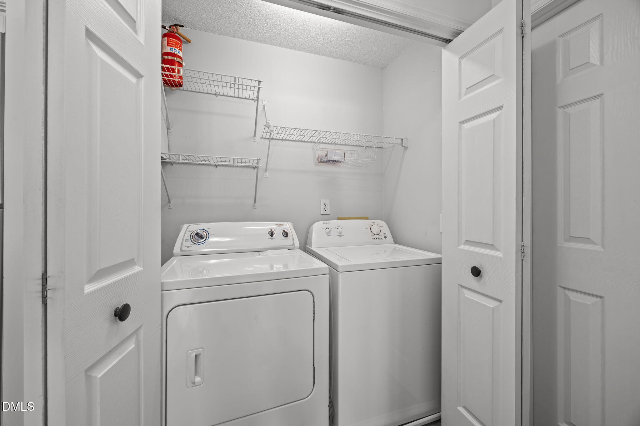 1210 Westview Lane, Unit 309 Raleigh, NC 27605 - Photo 16 of 42 a utility room with dryer and washer