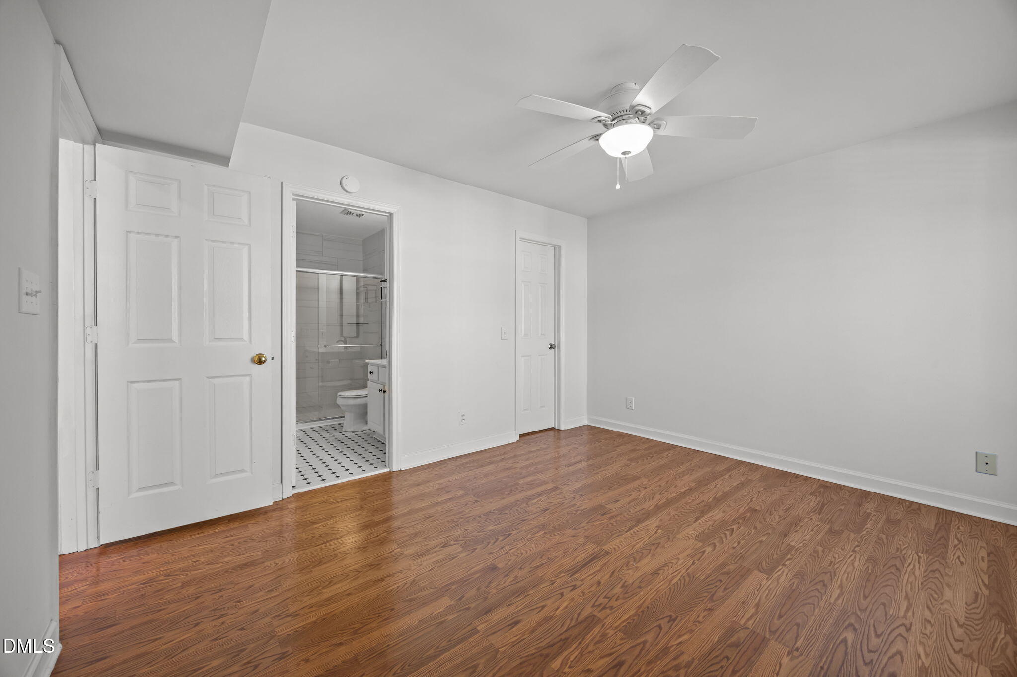 1210 Westview Lane, Unit 309 Raleigh, NC 27605 - Photo 19 of 42 a view of an empty room with wooden floor