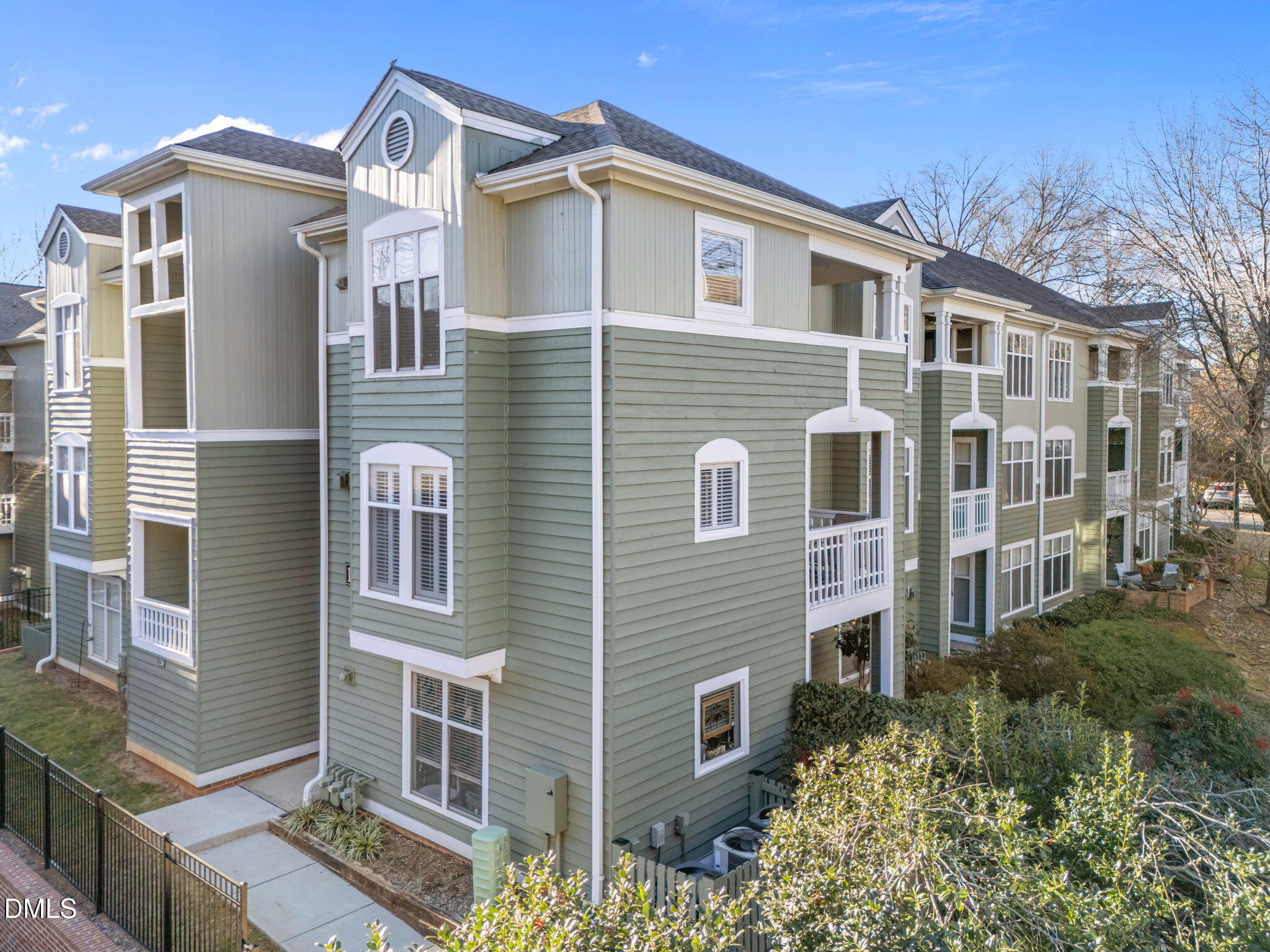 1210 Westview Lane, Unit 309 Raleigh, NC 27605 - Photo 2 of 42 a front view of a house with a yard