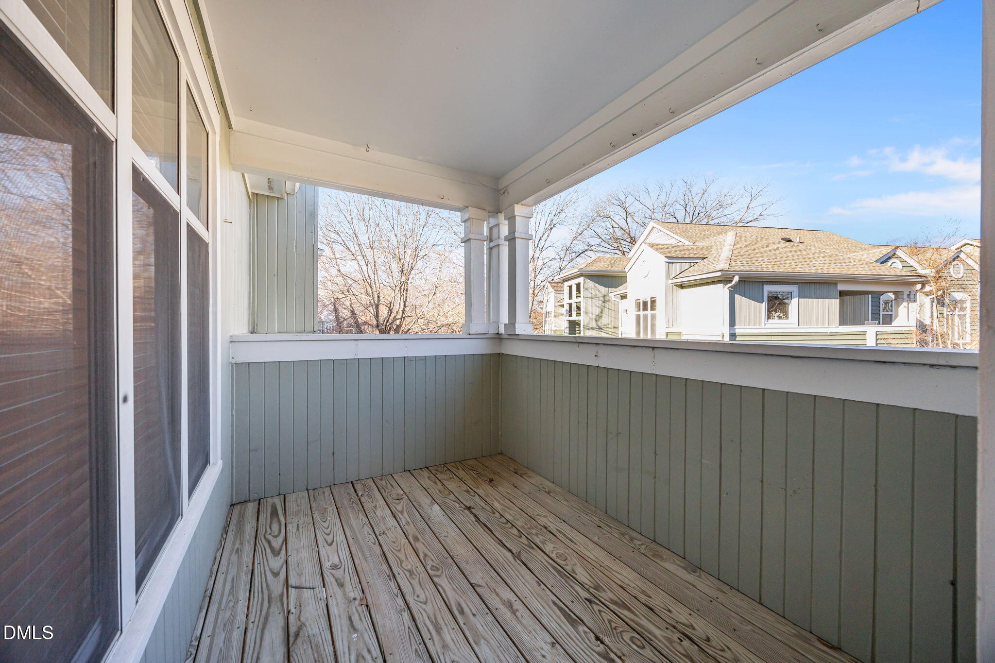 1210 Westview Lane, Unit 309 Raleigh, NC 27605 - Photo 22 of 42 a view of an empty room with a window and wooden floor