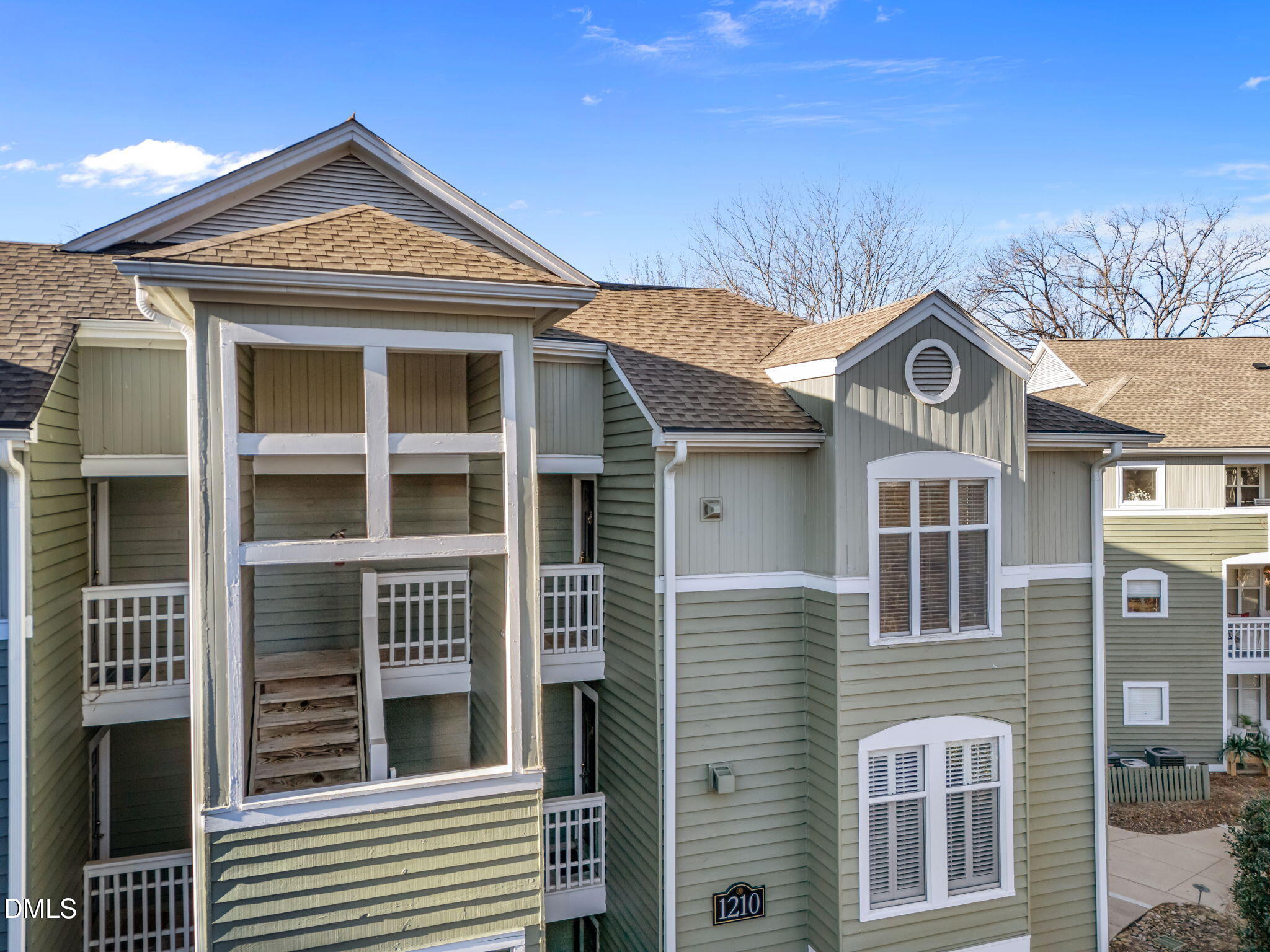 1210 Westview Lane, Unit 309 Raleigh, NC 27605 - Photo 25 of 42 a front view of a house with a yard