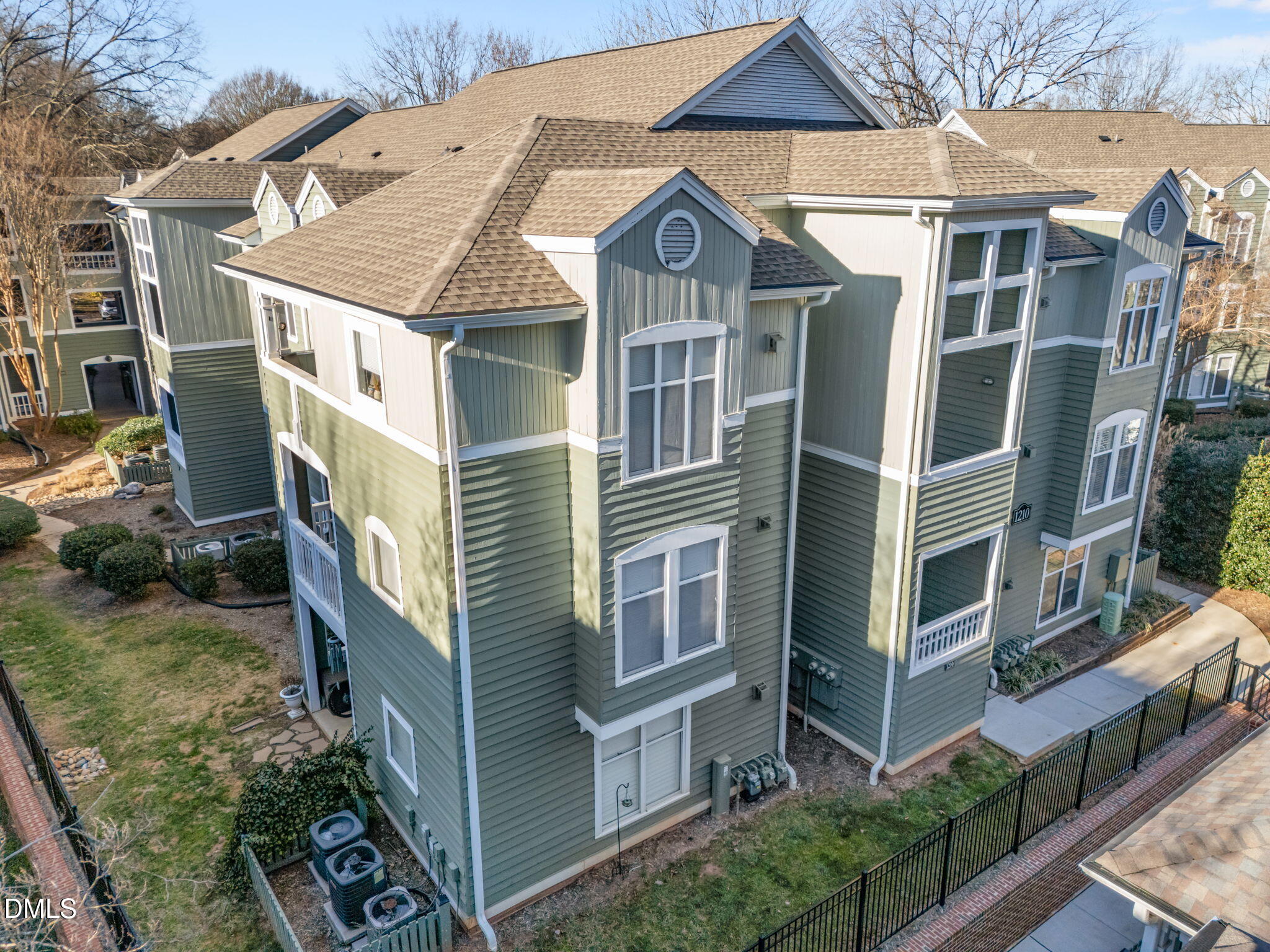 1210 Westview Lane, Unit 309 Raleigh, NC 27605 - Photo 26 of 42 a aerial view of a house with a yard