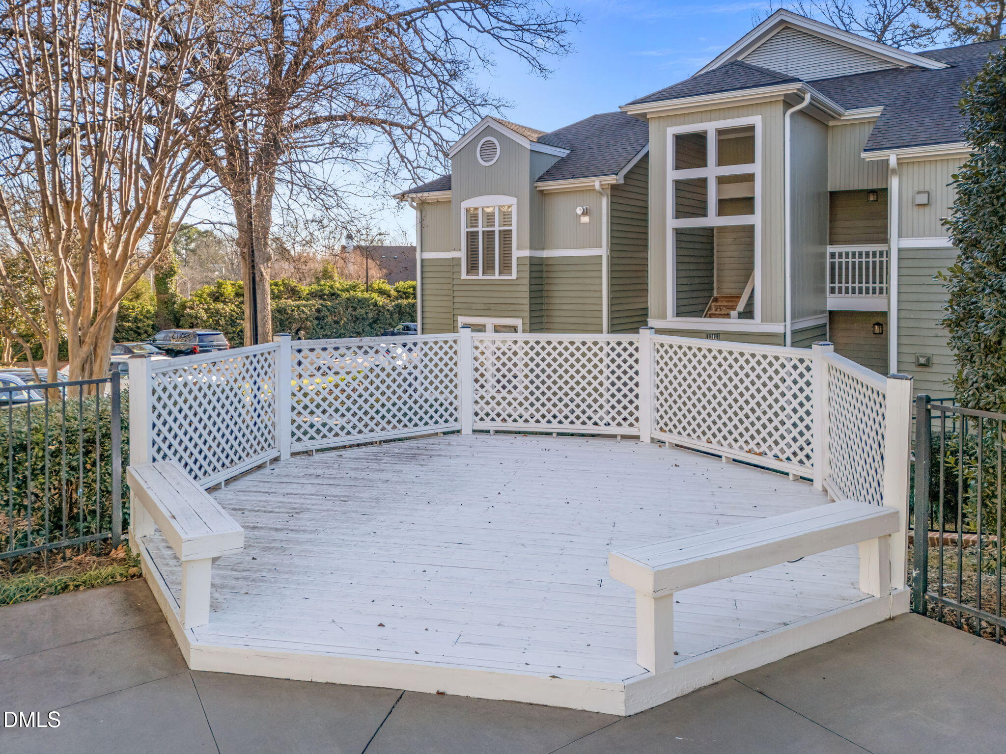 1210 Westview Lane, Unit 309 Raleigh, NC 27605 - Photo 30 of 42 a view of a house with a wooden fence