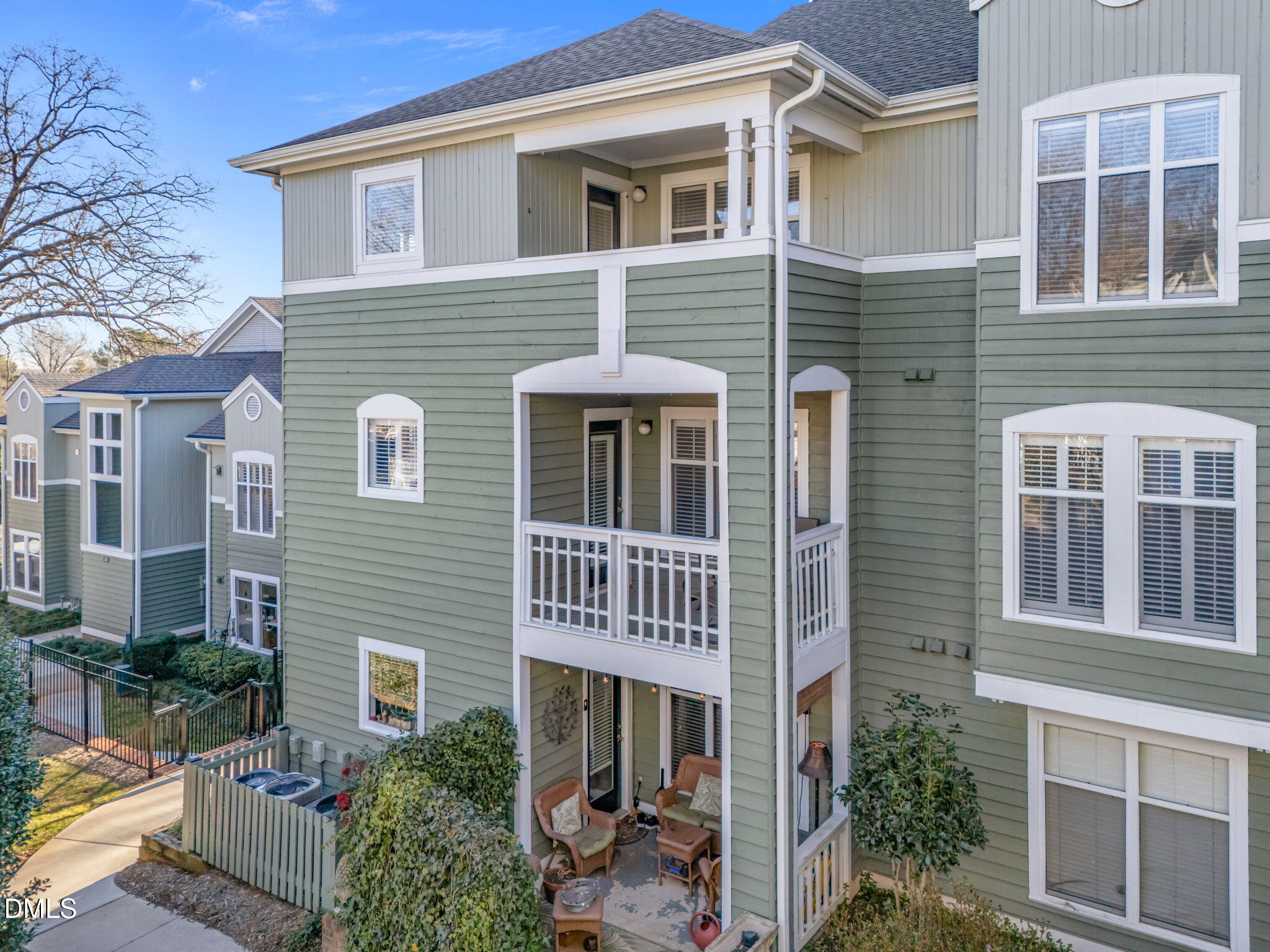 1210 Westview Lane, Unit 309 Raleigh, NC 27605 - Photo 3 of 42 a front view of a house with a yard