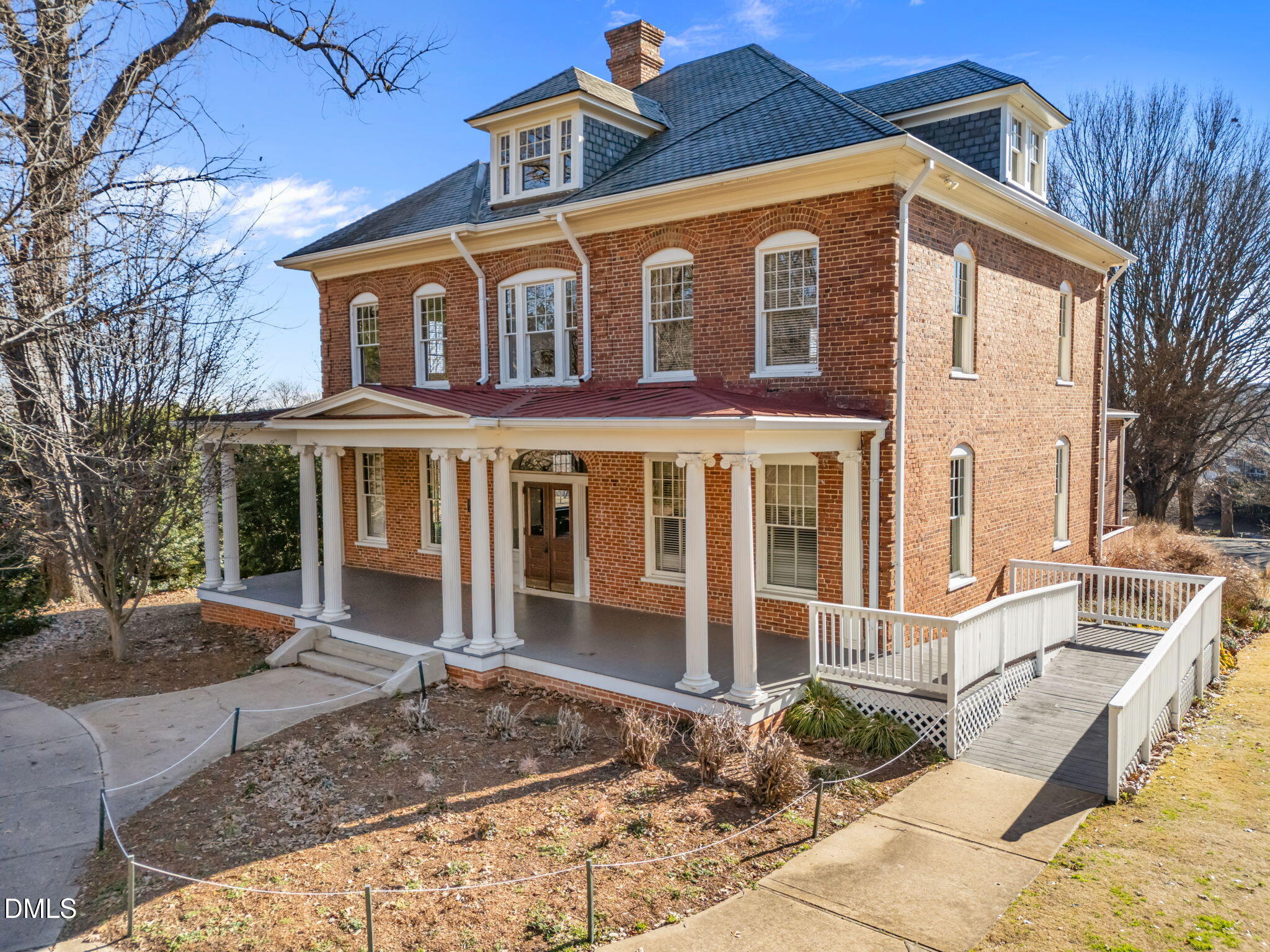 1210 Westview Lane, Unit 309 Raleigh, NC 27605 - Photo 41 of 42 a front view of a house with garden