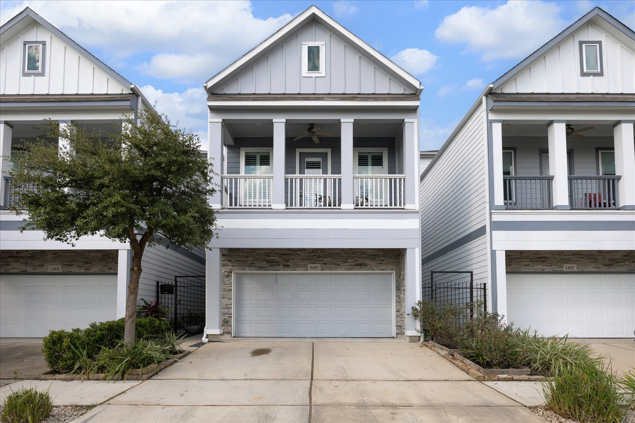 2430 Sheridan Street Houston, TX 77030 - Photo 1 of 28 a front view of a house with yard