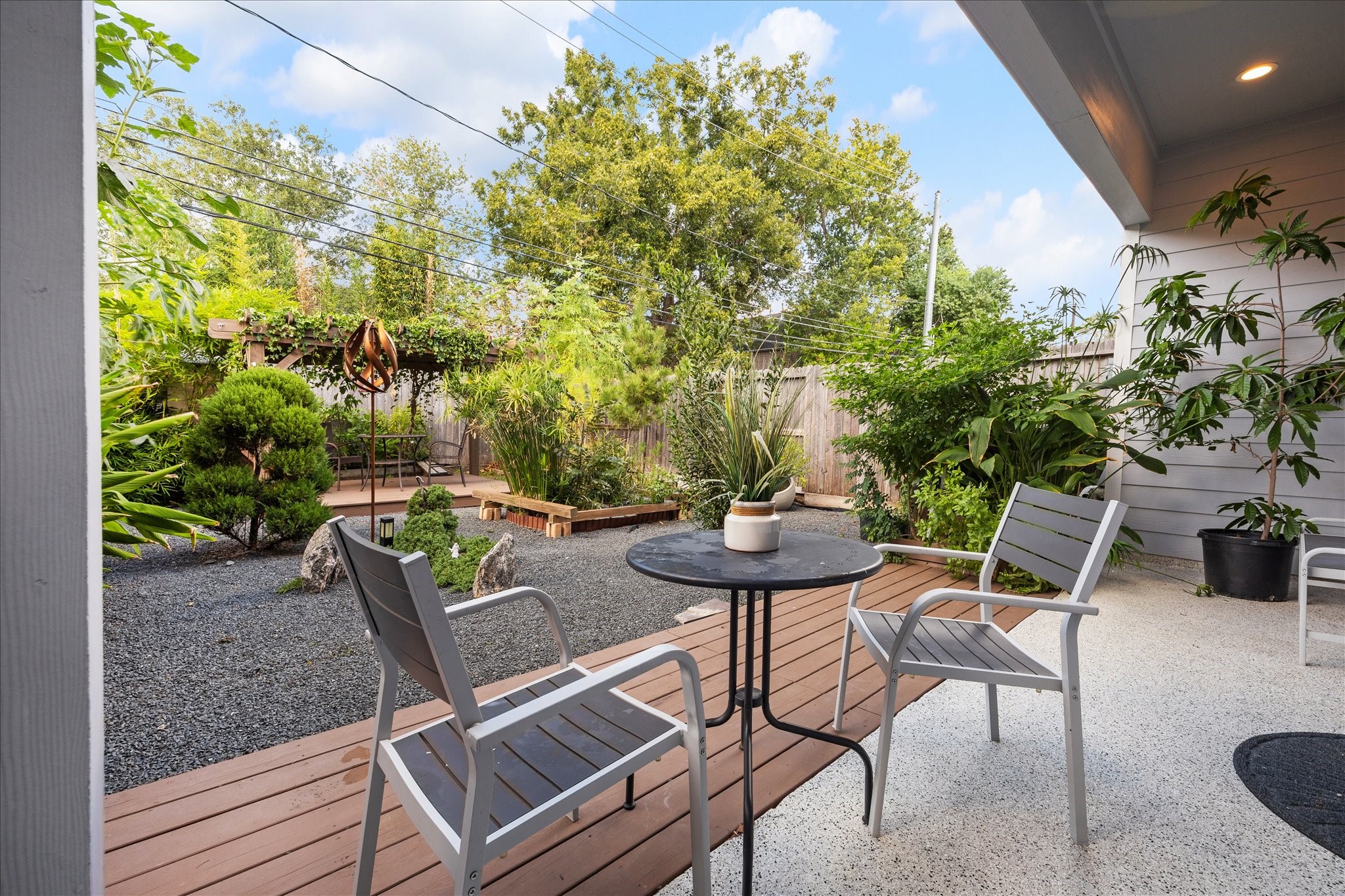 2430 Sheridan Street Houston, TX 77030 - Photo 25 of 28 a view of a chairs and table in patio