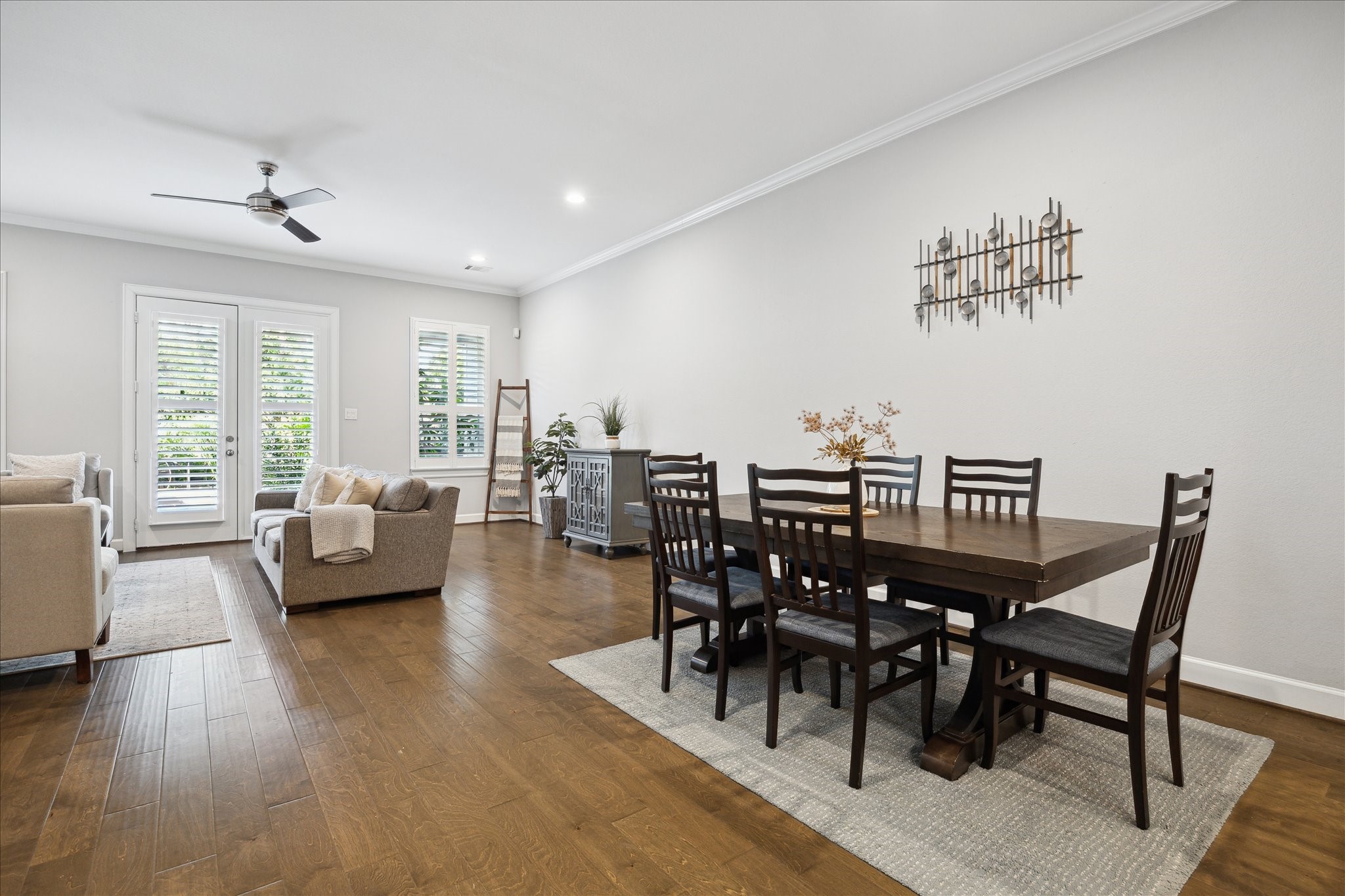 2430 Sheridan Street Houston, TX 77030 - Photo 3 of 28 a view of a dining room with furniture window and wooden floor