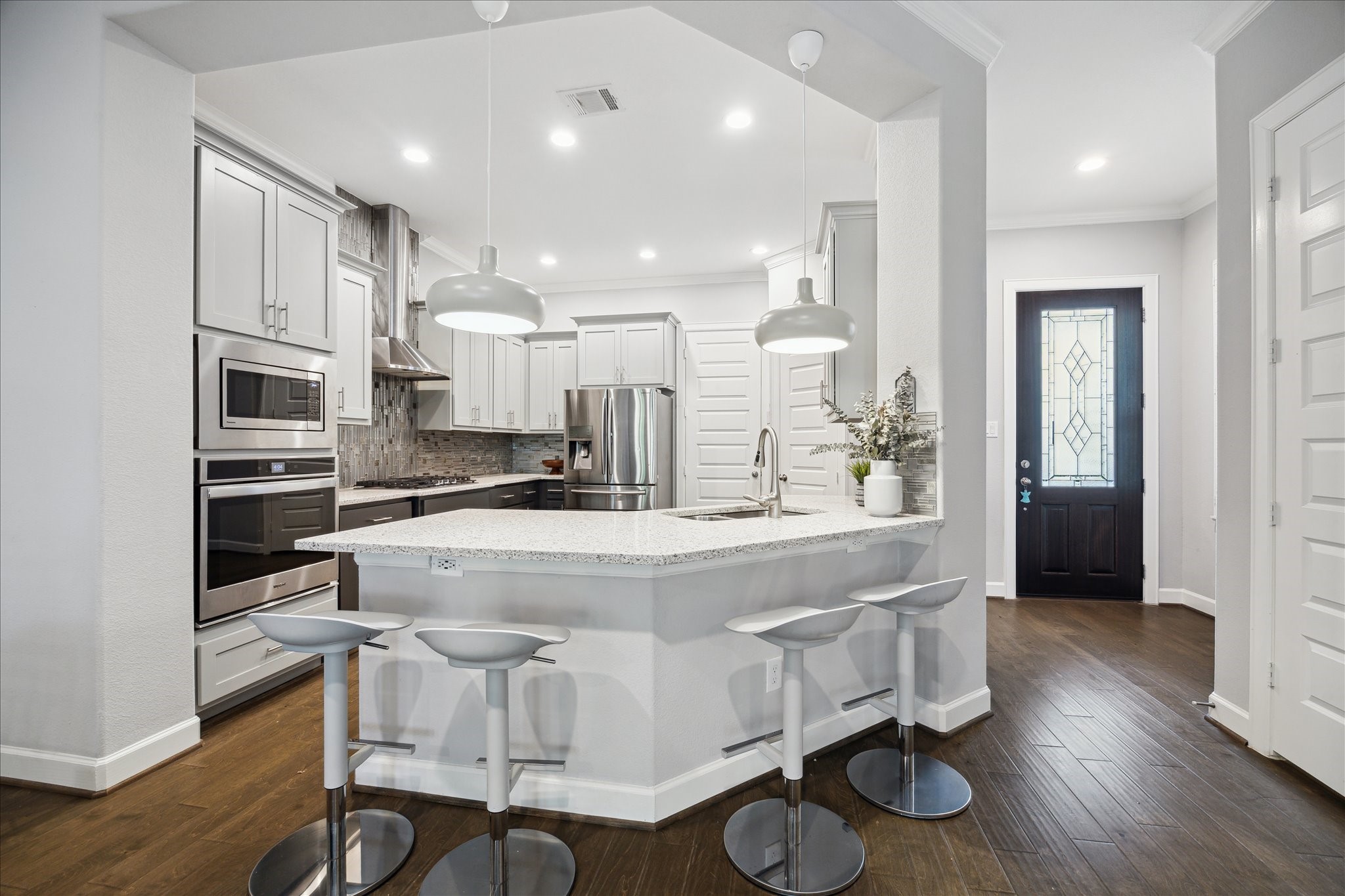 2430 Sheridan Street Houston, TX 77030 - Photo 8 of 28 a large white kitchen with lots of counter space and window