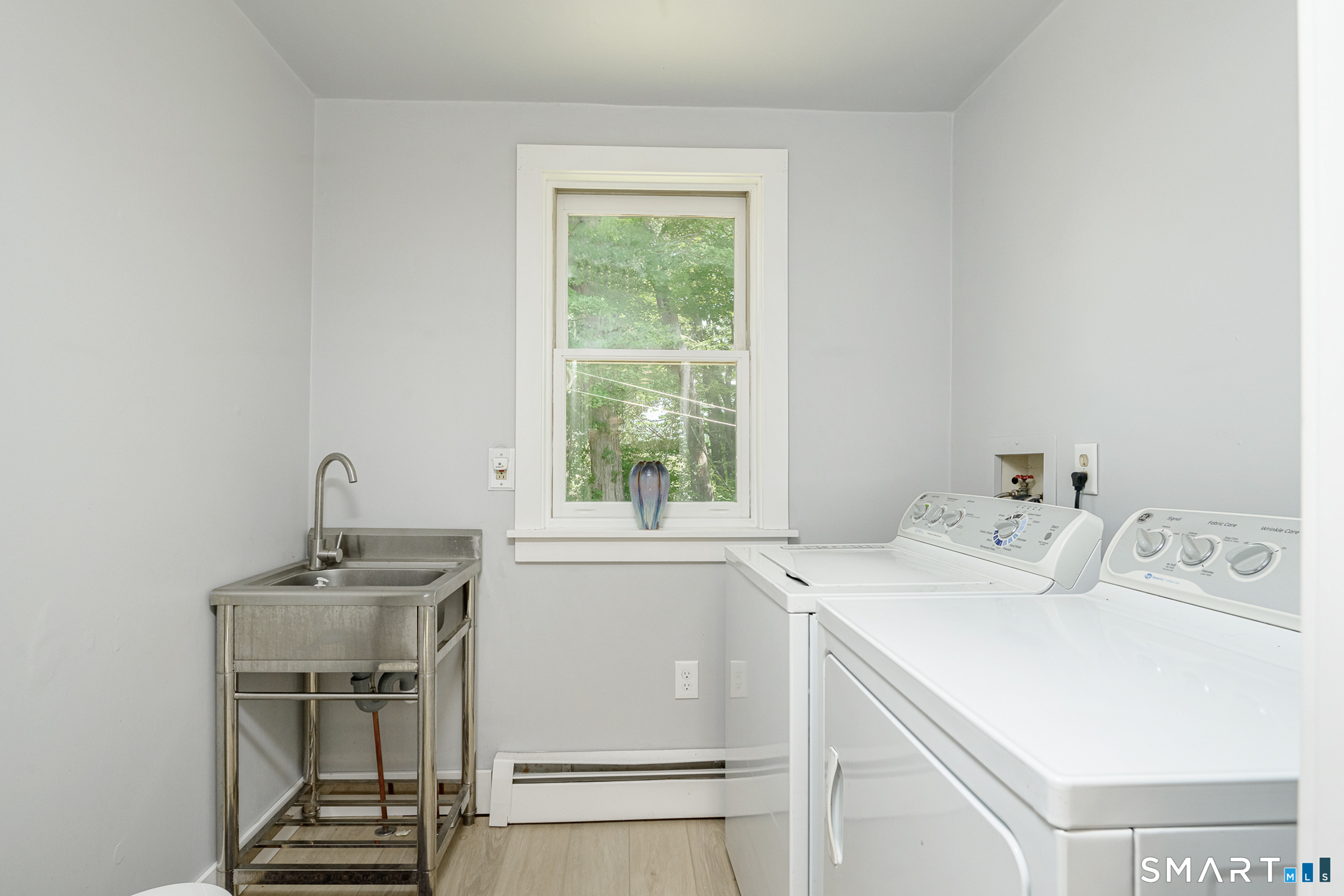 21 Duffy Road Pomfret, CT 06259 - Photo 25 of 40 Half bathroom/Laundry room on main level
