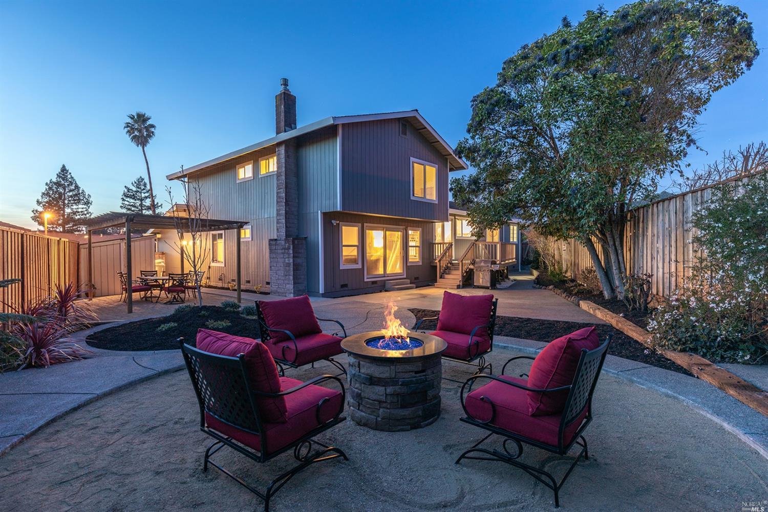 a outdoor living space with furniture and garden view