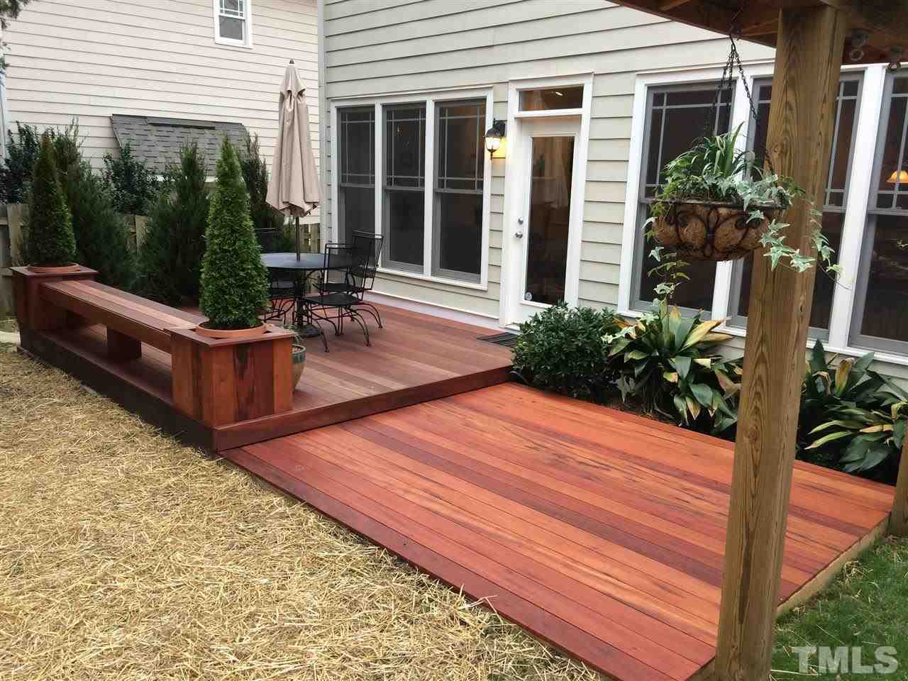 537 Pace Street Raleigh, NC 27604 - Photo 11 of 25 a view of a backyard with sitting area