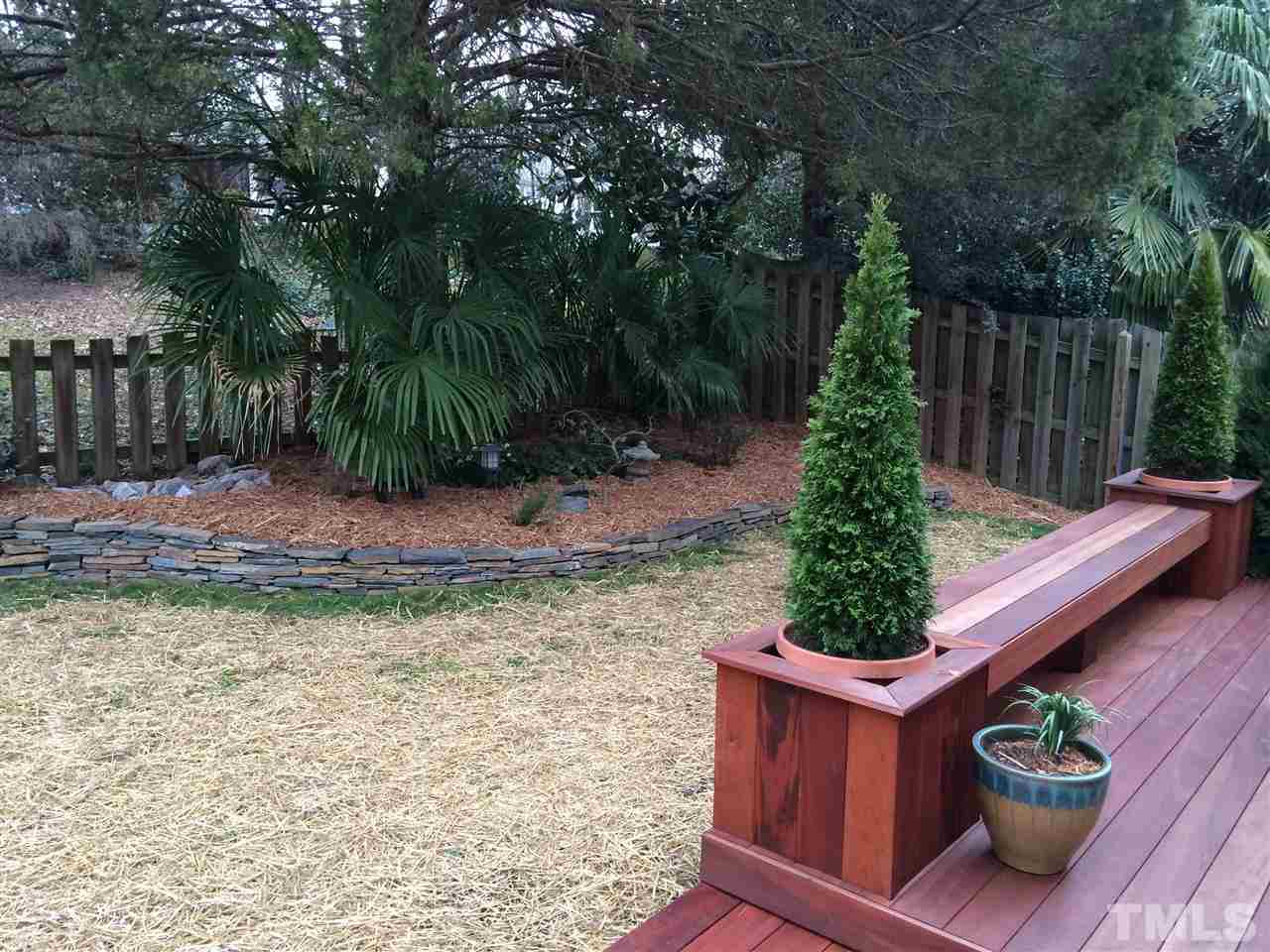 537 Pace Street Raleigh, NC 27604 - Photo 13 of 25 a wooden fence with some plants