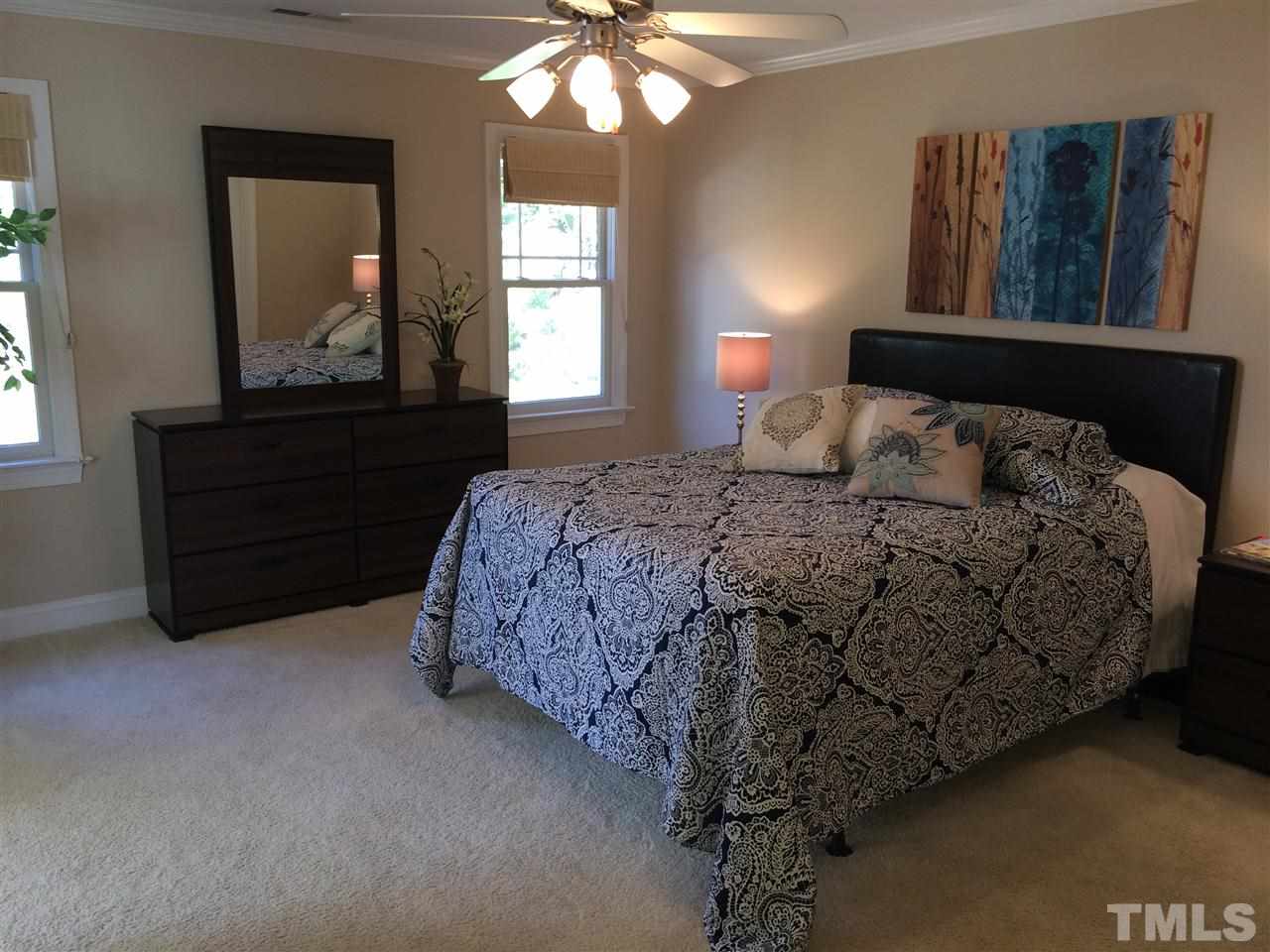 537 Pace Street Raleigh, NC 27604 - Photo 16 of 25 a bedroom with a bed and window
