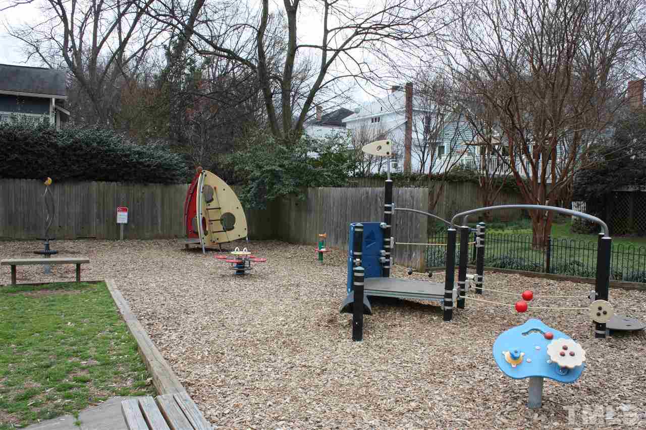 537 Pace Street Raleigh, NC 27604 - Photo 25 of 25 a backyard of a house with table and chairs