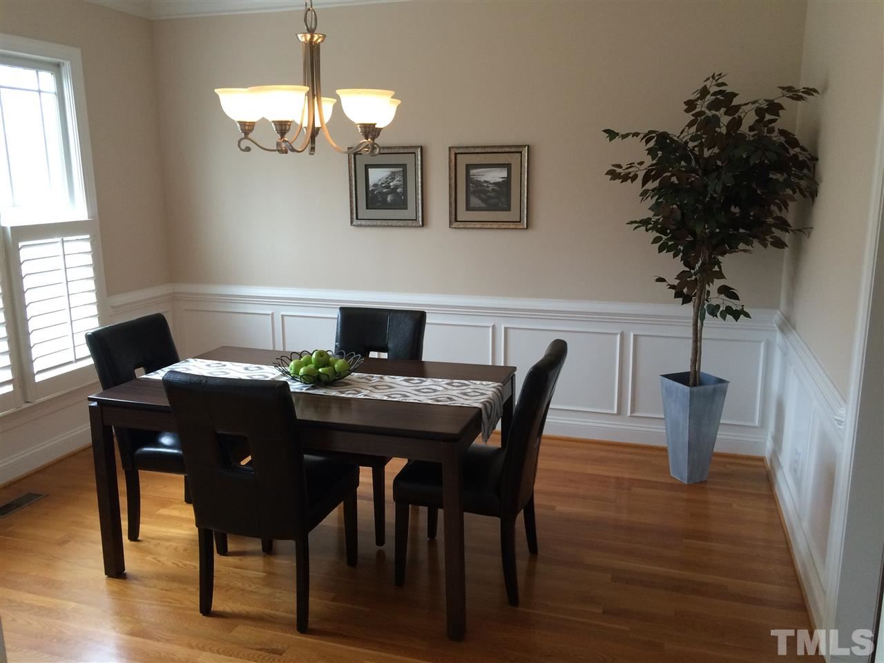 537 Pace Street Raleigh, NC 27604 - Photo 10 of 25 a view of a dining room with furniture and wooden floor