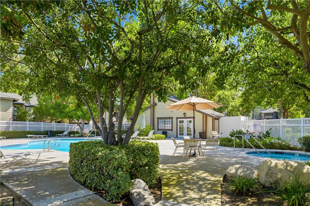 20702 El Toro Road, Unit 231 Lake Forest, CA 92630 - Photo 35 of 36 a front view of a house with garden