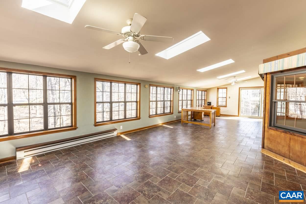 73 Amethyst Road Palmyra, VA 22963 - Photo 27 of 56 a view of empty room with wooden floor and fan