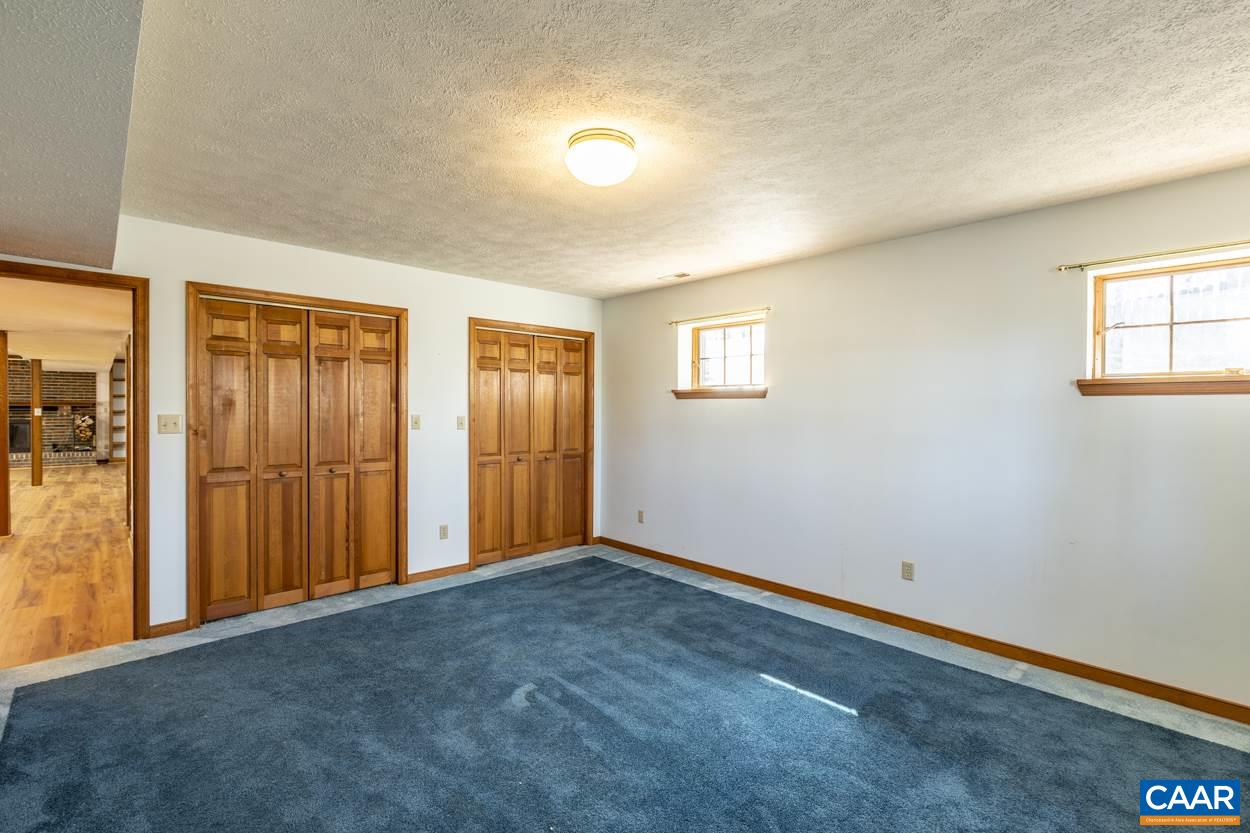 73 Amethyst Road Palmyra, VA 22963 - Photo 41 of 56 an empty room with windows and closet