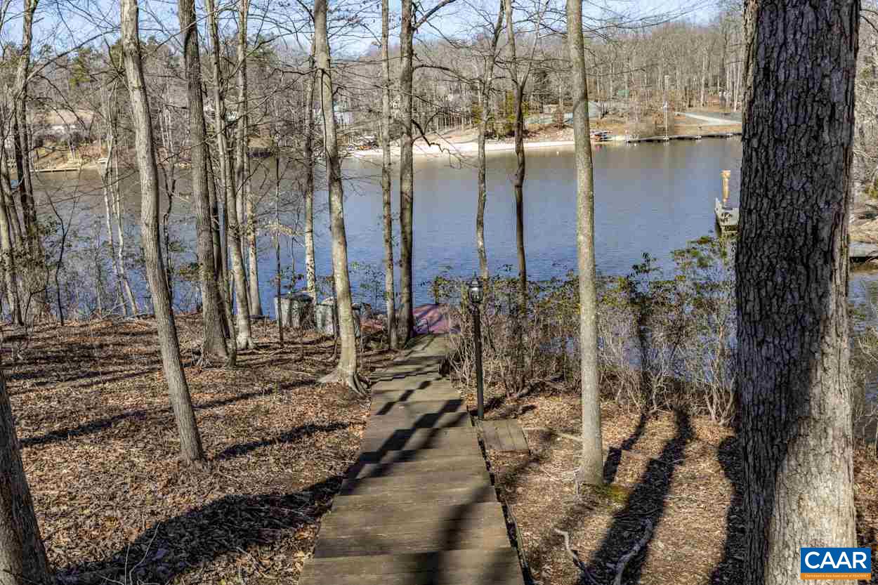73 Amethyst Road Palmyra, VA 22963 - Photo 5 of 56 a view of a yard with an trees