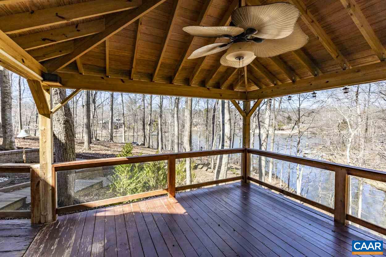 73 Amethyst Road Palmyra, VA 22963 - Photo 7 of 56 a view of an empty room with wooden floor and windows