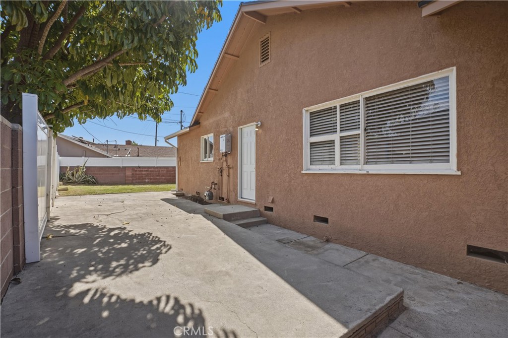 14808 Aztec Street Sylmar, CA 91342 - Photo 19 of 23 a view of a house with a backyard