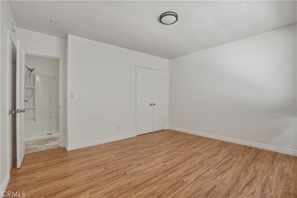 14808 Aztec Street Sylmar, CA 91342 - Photo 7 of 23 wooden floor in an empty room