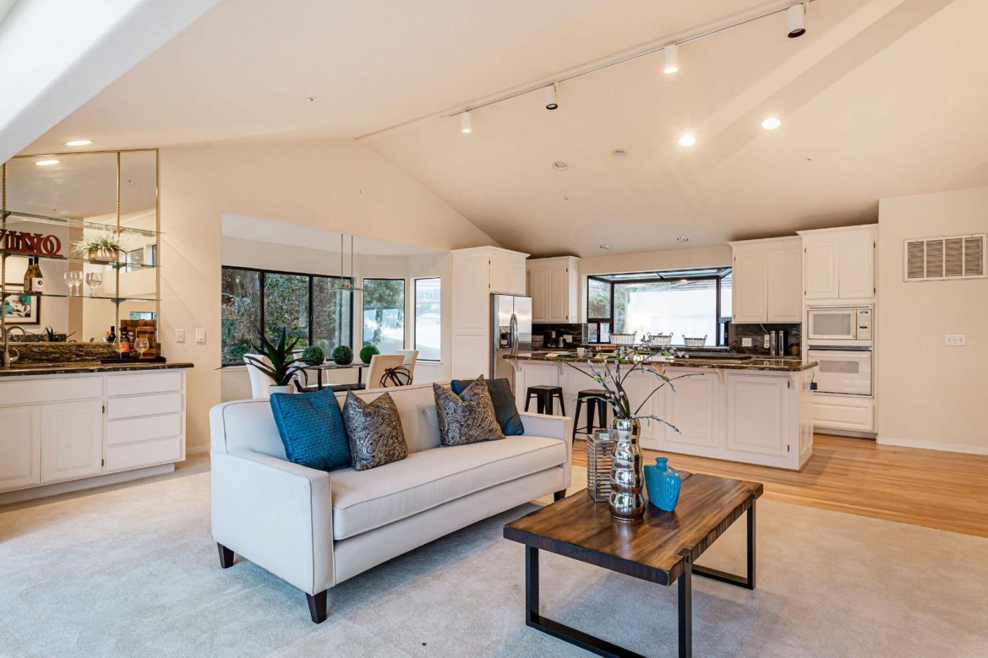 745 Holly Road Belmont, CA 94002 - Photo 11 of 50 a living room with furniture and view of kitchen