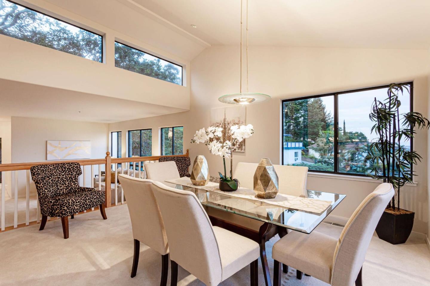 745 Holly Road Belmont, CA 94002 - Photo 13 of 50 a dining room with furniture a chandelier and wooden floor