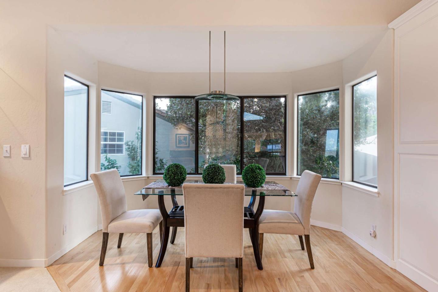 745 Holly Road Belmont, CA 94002 - Photo 15 of 50 a dining room with furniture window and wooden floor