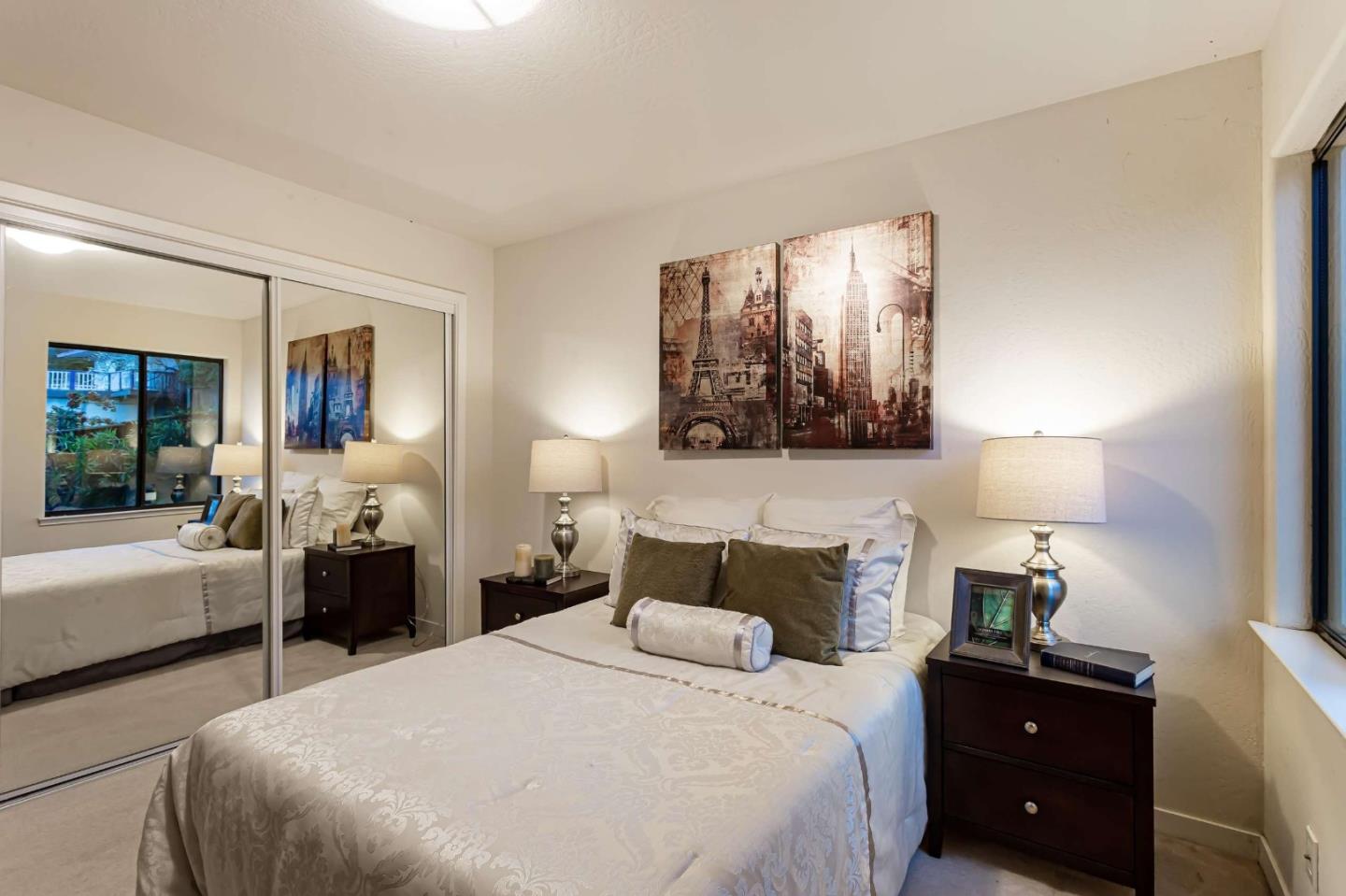 745 Holly Road Belmont, CA 94002 - Photo 22 of 50 a bedroom with a bed and a couch