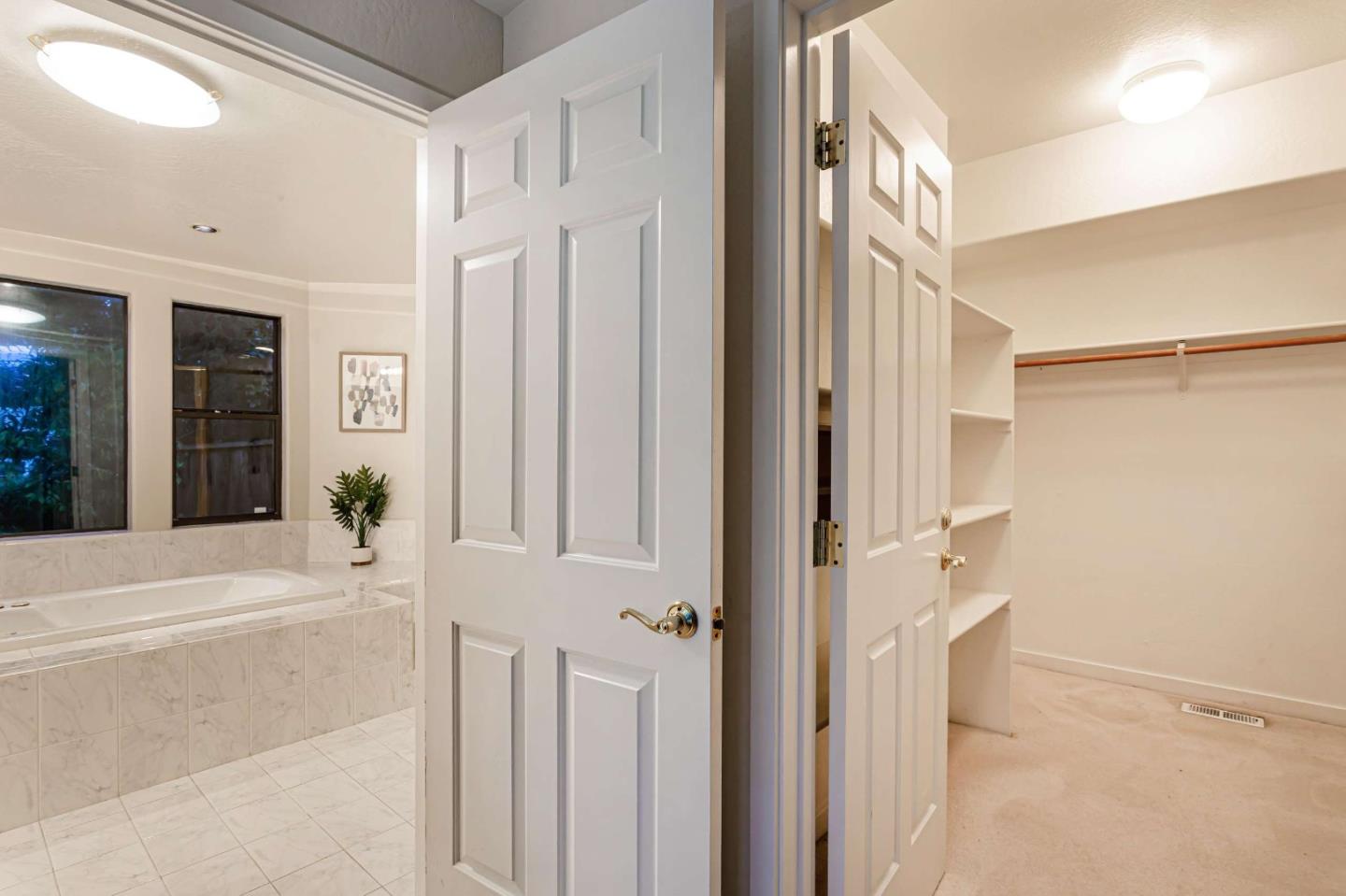 745 Holly Road Belmont, CA 94002 - Photo 27 of 50 a view of a hallway with a white walls