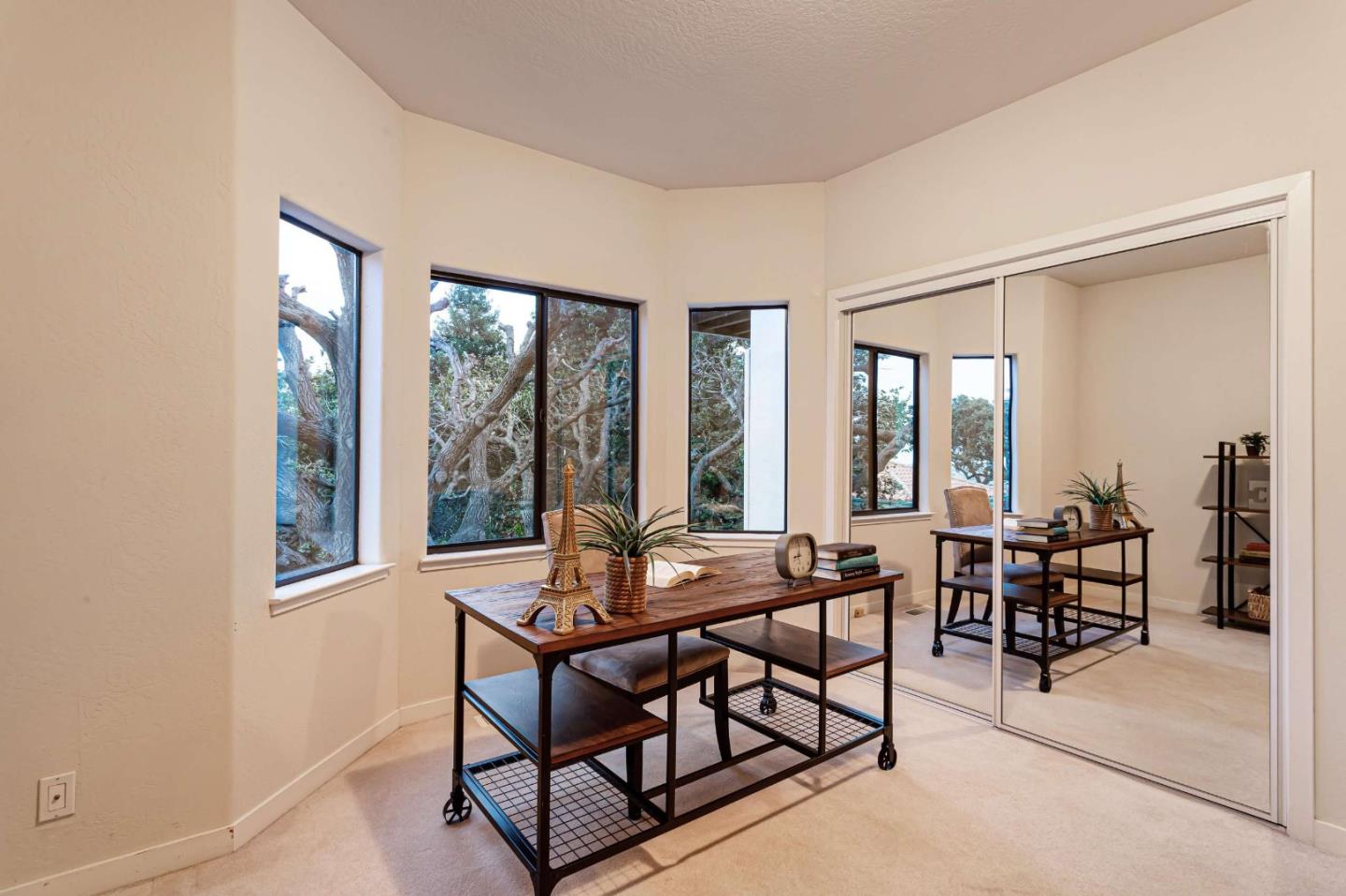 745 Holly Road Belmont, CA 94002 - Photo 31 of 50 a dining room with furniture and large windows