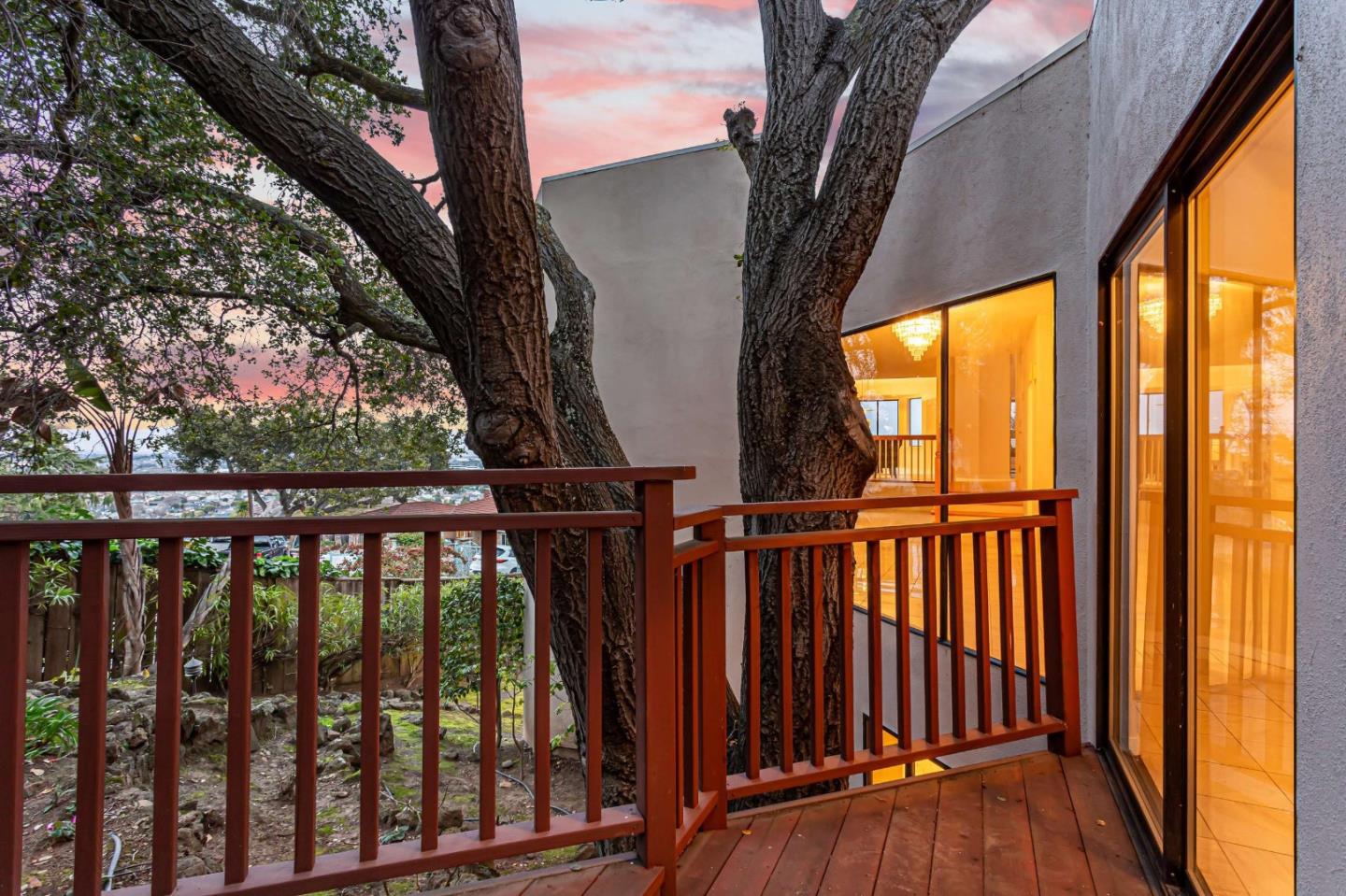 745 Holly Road Belmont, CA 94002 - Photo 37 of 50 a view of staircase with railing and trees