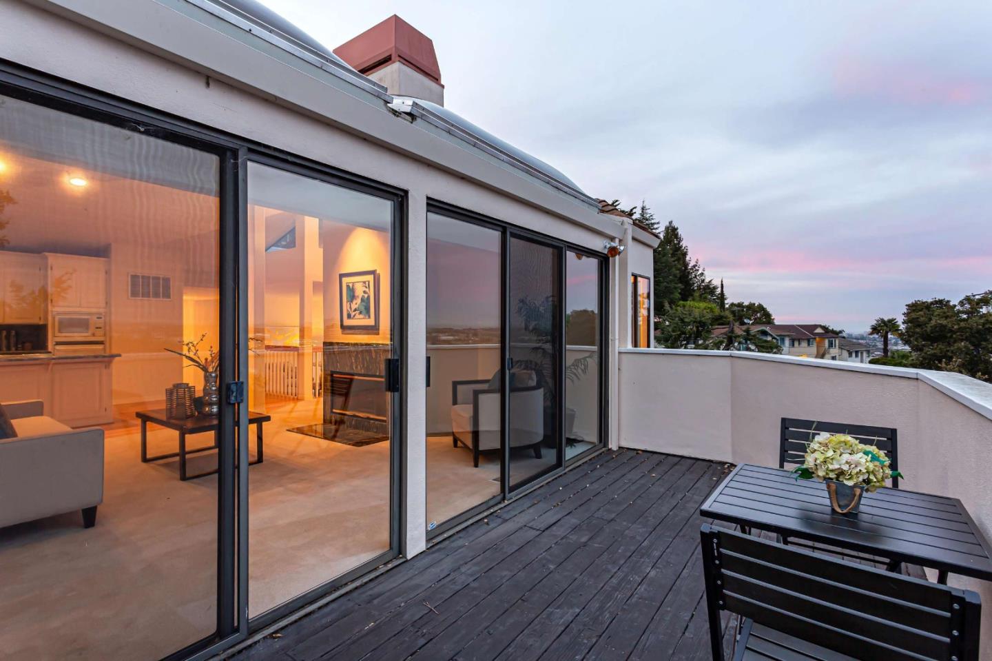 745 Holly Road Belmont, CA 94002 - Photo 40 of 50 a view of a living room and a balcony