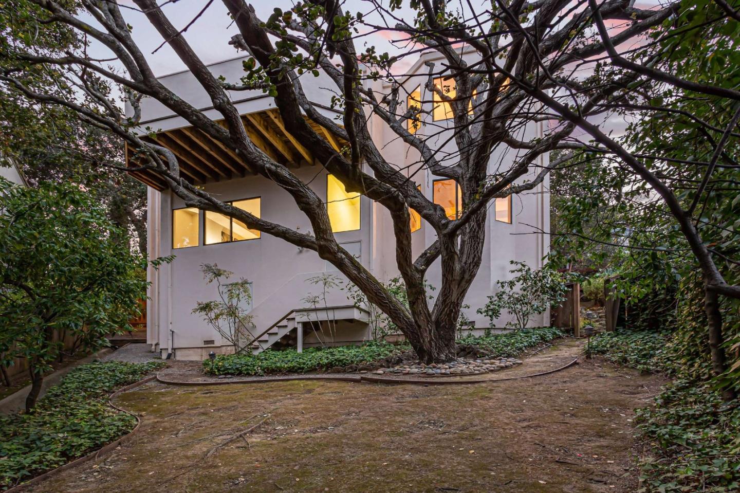 745 Holly Road Belmont, CA 94002 - Photo 41 of 50 a view of a house with a tree and yard